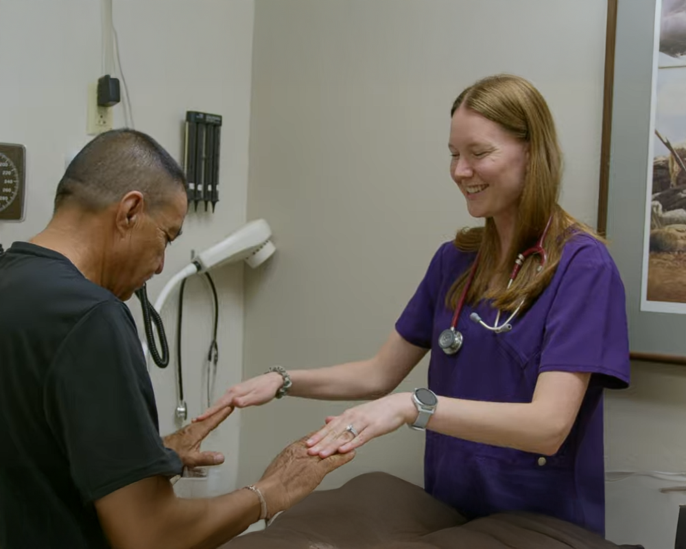 Dr Andrea Meets with Patient Neighborhood Christian Clinic