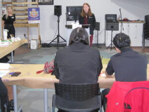 Dr. Andrea speaks with students from Neighborhood Ministries at Neighborhood Christian Clinic about public health and the five social determinants of health.